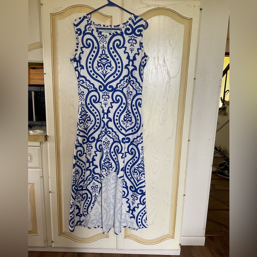 Blue and white patterned high low maxi dress size m but is more of a large